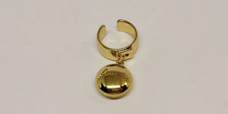 Anel dourado aberto com meia-esfera polida pendente — ref. ANL0041A