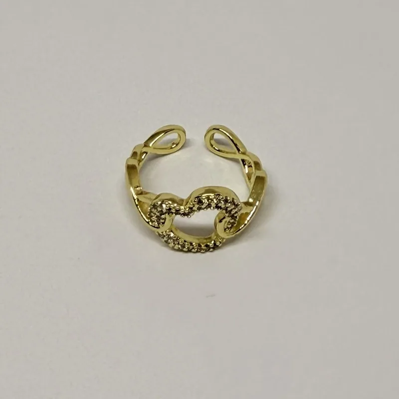 Anel dourado aberto com elos ovais cravejados — ref. ANQ0049A
