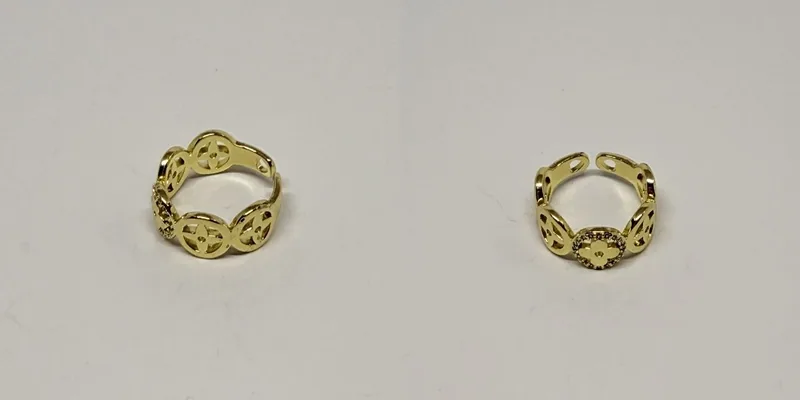 Anel dourado com medalhões florais vazados ao redor do aro — ref. ANL0026A