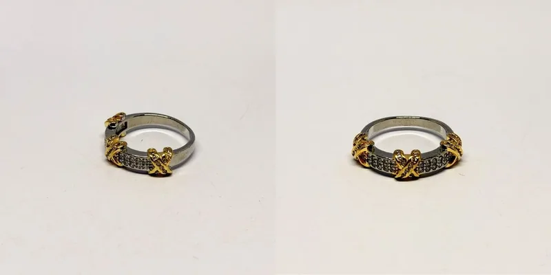 Anel prateado de aro fino com detalhe dourado em X ao centro — ref. ANL0139A