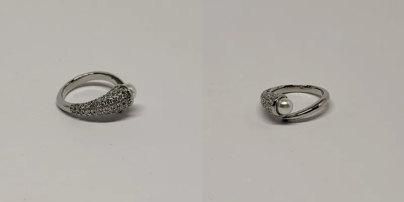 Anel prateado de aros cruzados com faixa cravejada — ref. ANL0048A