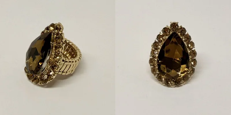 Anel prateado com formato de estrela e cristal central — ref. ANL0052A
