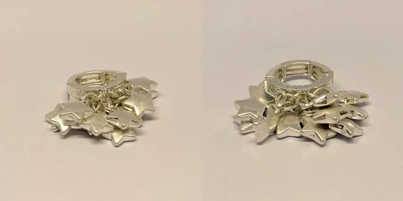 Anel prateado em formato de flor com pétalas pontiagudas em relevo — ref. ANL0129A