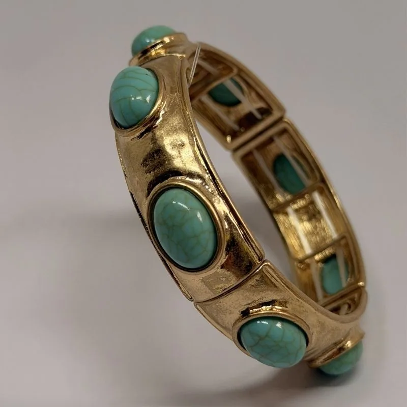 Bracelete dourado rígido com cabochões e placas em turquesa — ref. BTE0107A