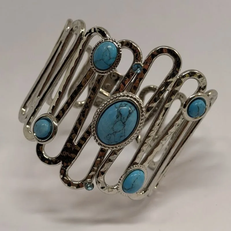 Bracelete prateado de aros paralelos com pedras turquesa aplicadas — ref. BTE0103A