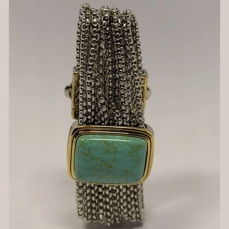 Bracelete prateado em várias fileiras de malha com pedra turquesa retangular ao centro — ref. BTE0099A